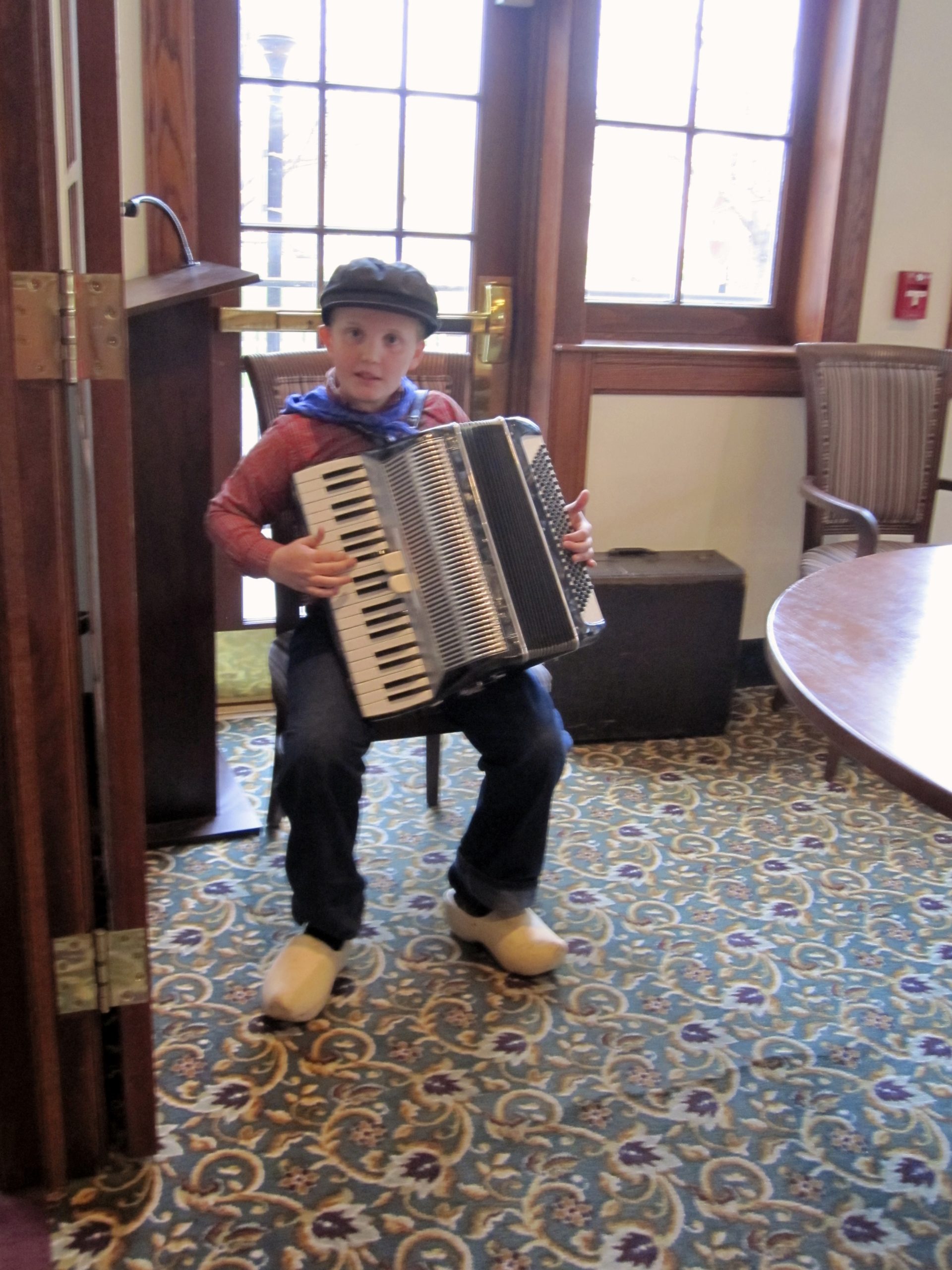 Max Thompson at age 11, royal amsterdam hotel, pella, IA, accordionist, accordion, dutch